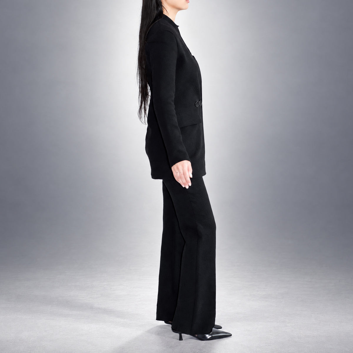 STANDISH. Dolores Blazer in Carbon Black, a knit blazer, worn, side view #color_carbon black