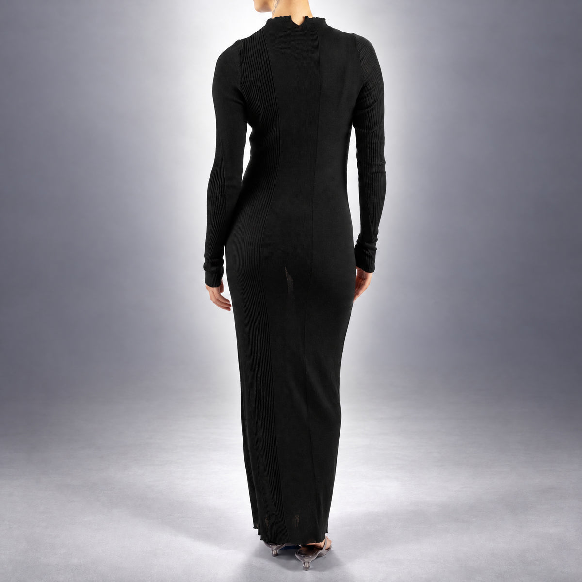STANDISH. Doreen Maxi Dress in Carbon Black, a knit maxi dress, worn, back view #color_carbon black