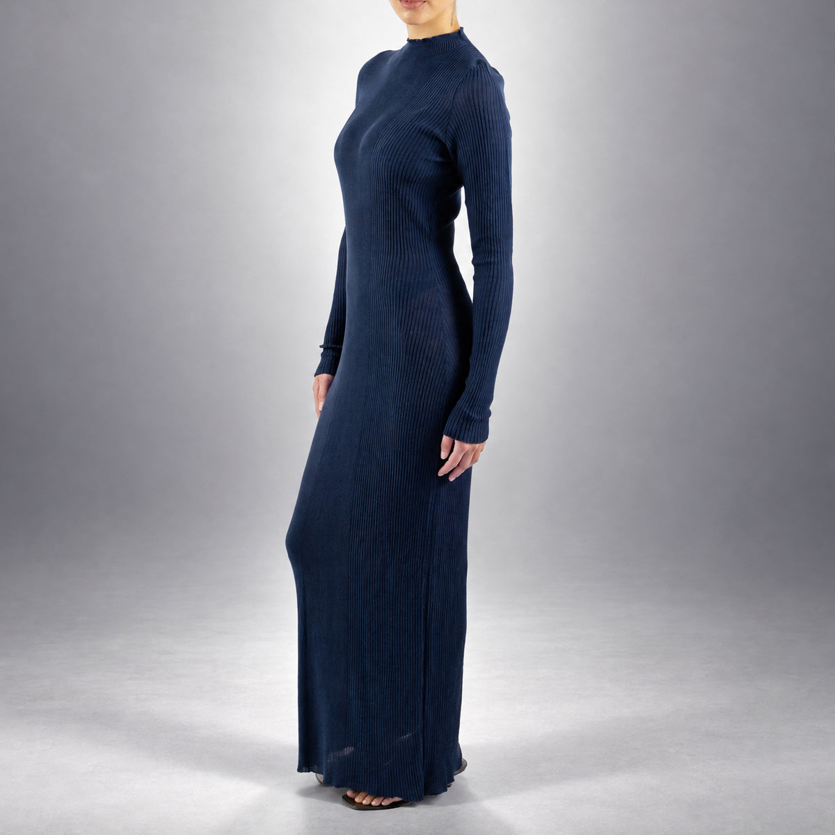 STANDISH. Doreen Maxi Dress in Ink Navy, a knit maxi dress, worn, side view #color_ink navy
