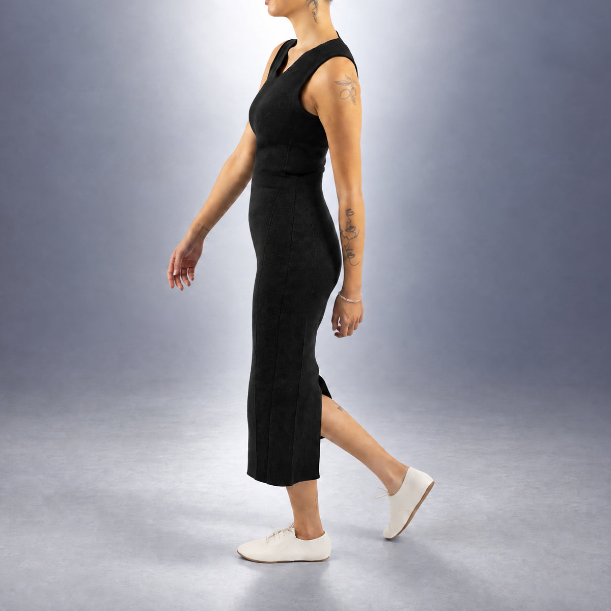 STANDISH. Evie Dress in Carbon Black, a knit dress, worn, side view #color_carbon black
