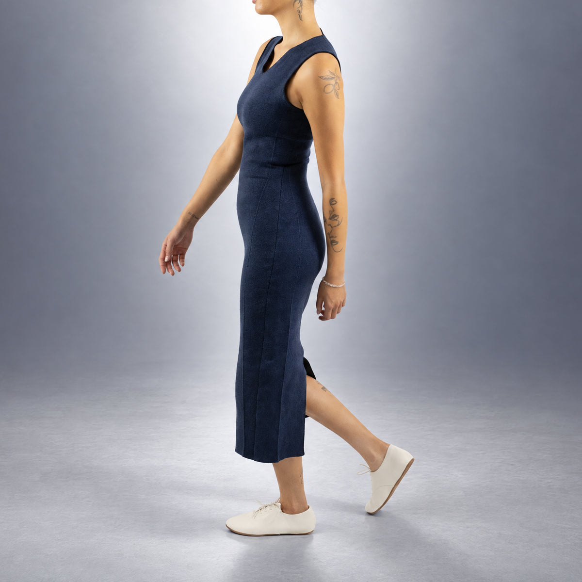 STANDISH. Evie Dress in Ink Navy, a knit dress, worn, side view #color_ink navy