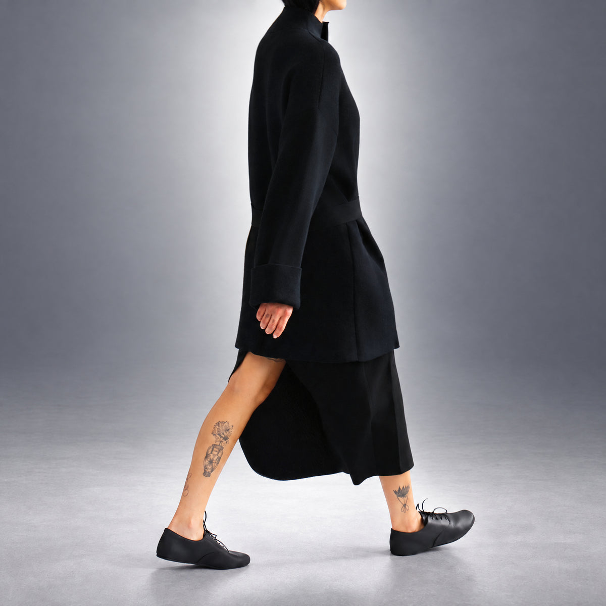 STANDISH. Jessica Coat in Carbon Black, a knit coat, worn, side view #color_carbon black