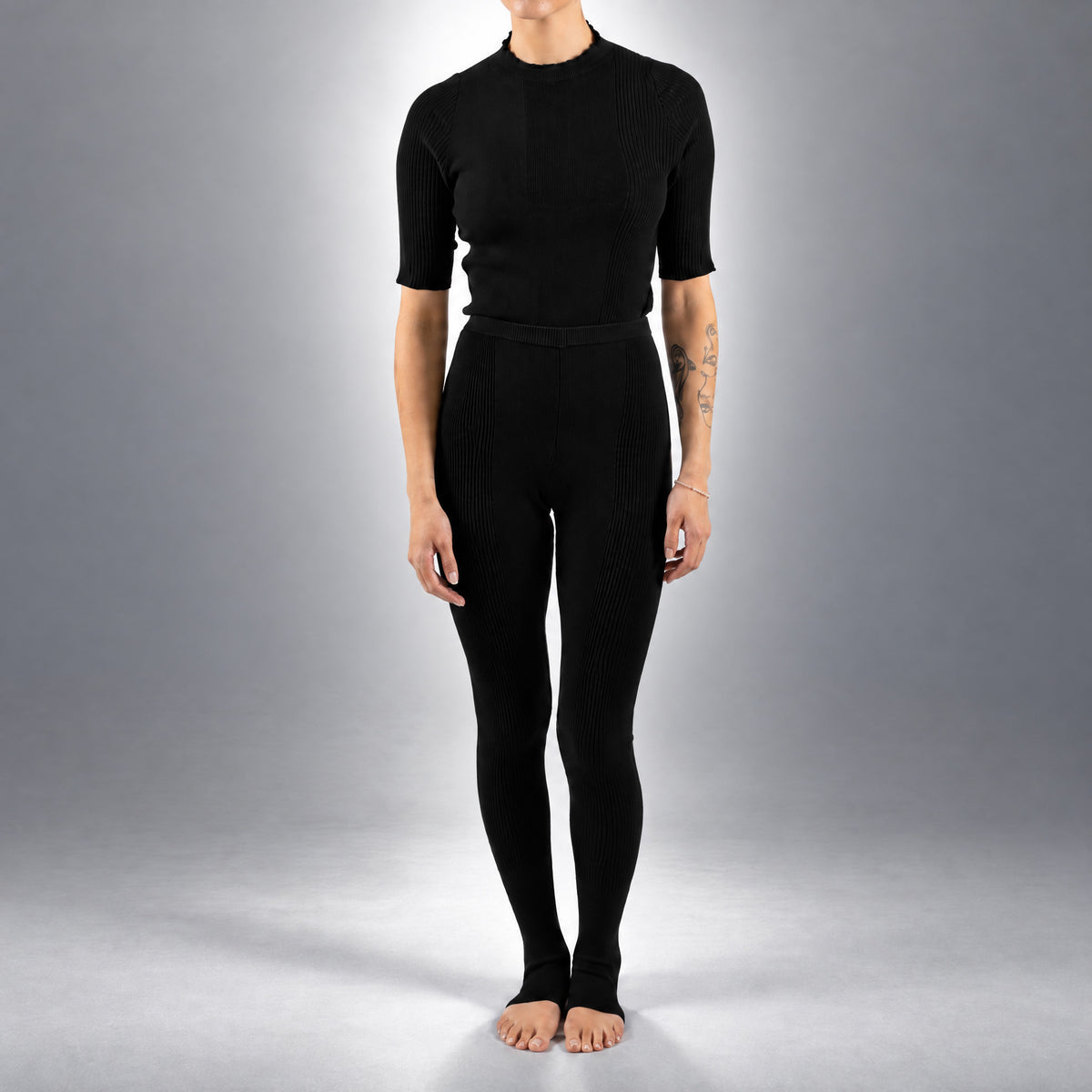 STANDISH. Jodi Tight in Carbon Black, a knit tight, worn, front view #color_carbon black