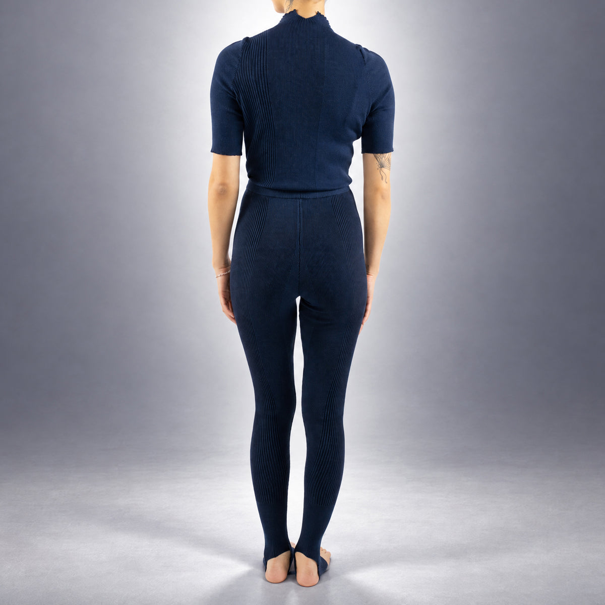 STANDISH. Jodi Tight in Ink Navy, a knit tight, worn, back view #color_ink navy