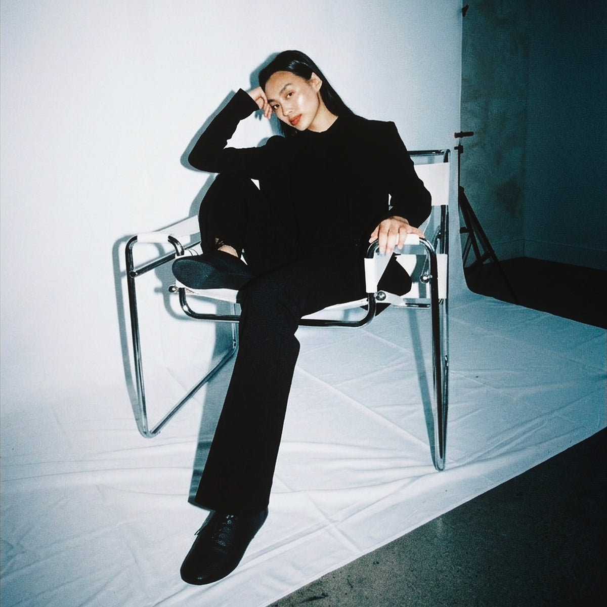 STANDISH. Lola Pant in Carbon Black, a knit pant, styled editorial shot #color_carbon black