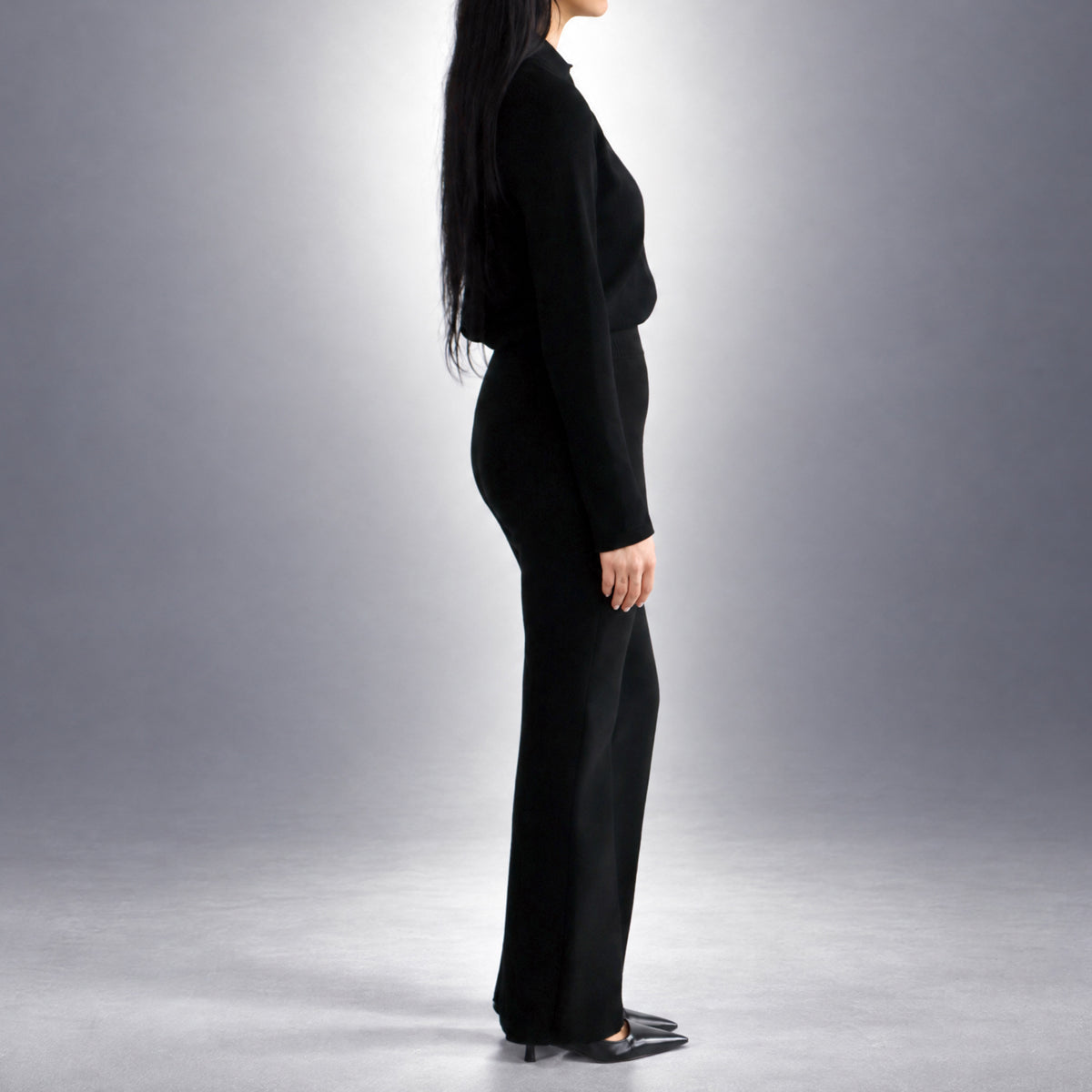 STANDISH. Lola Pant in Carbon Black, a knit pant, worn, side view #color_carbon black