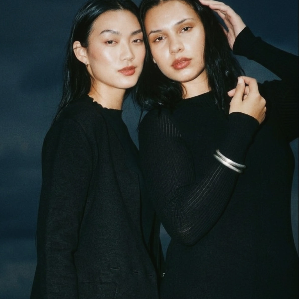 STANDISH. Doreen Maxi Dress in Carbon Black, a knit maxi dress, styled editorial shot #color_carbon black