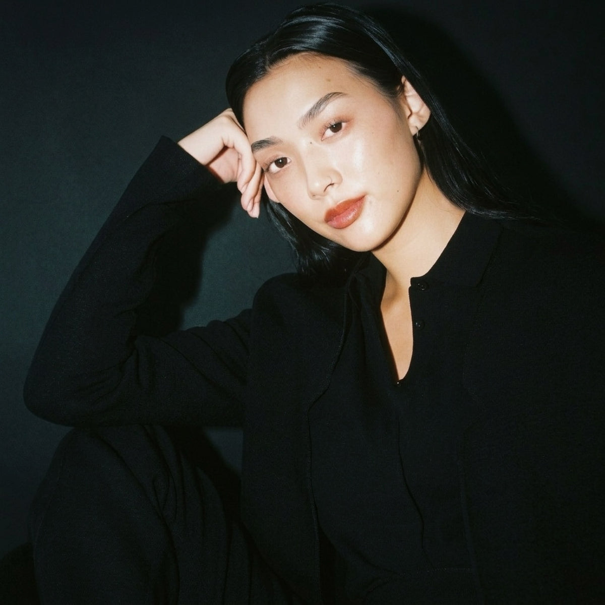 STANDISH. Gail Shirt in Carbon Black, a knit shirt, styled editorial shot #color_carbon black