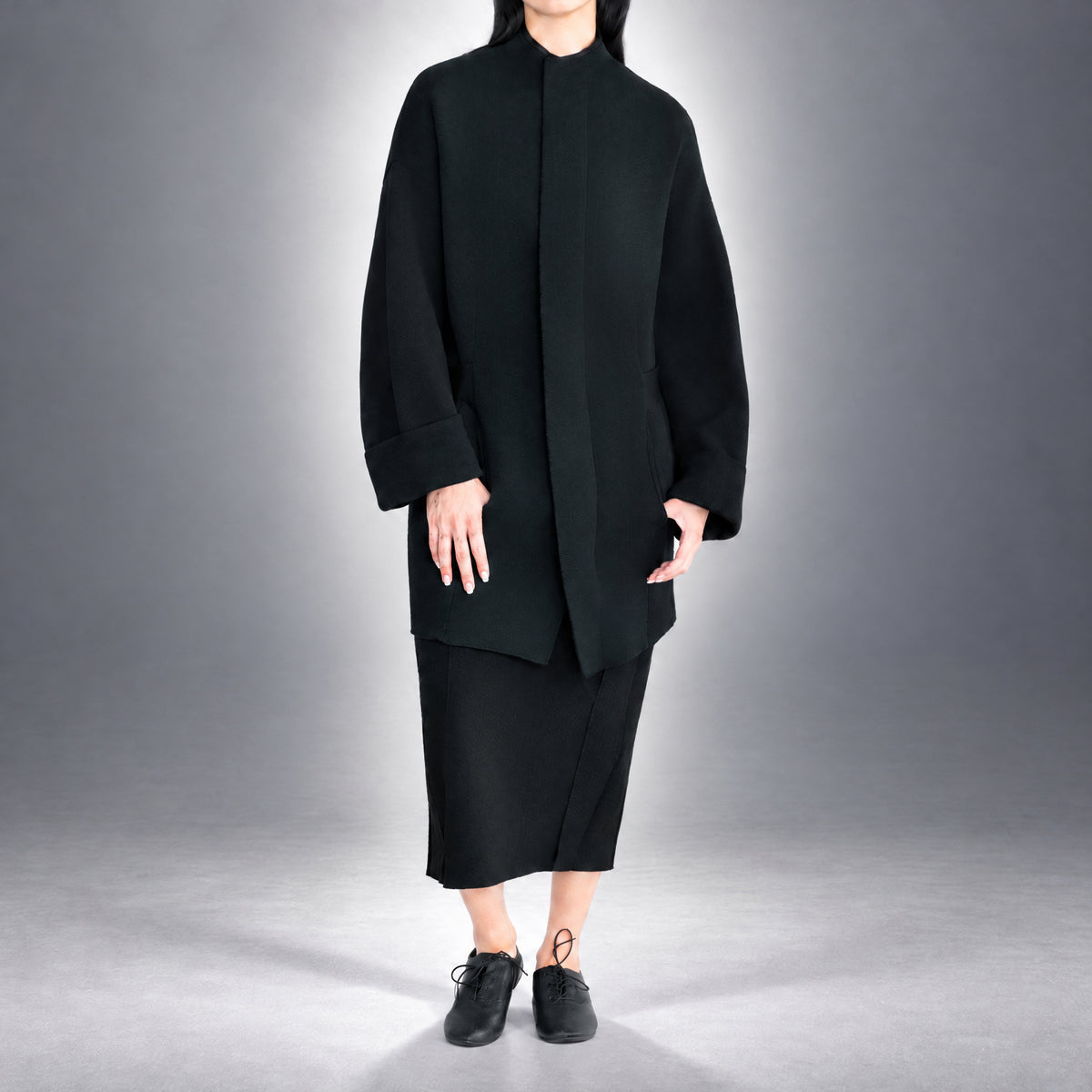 STANDISH. Jessica Coat in Carbon Black, a knit coat, worn, front view #color_carbon black