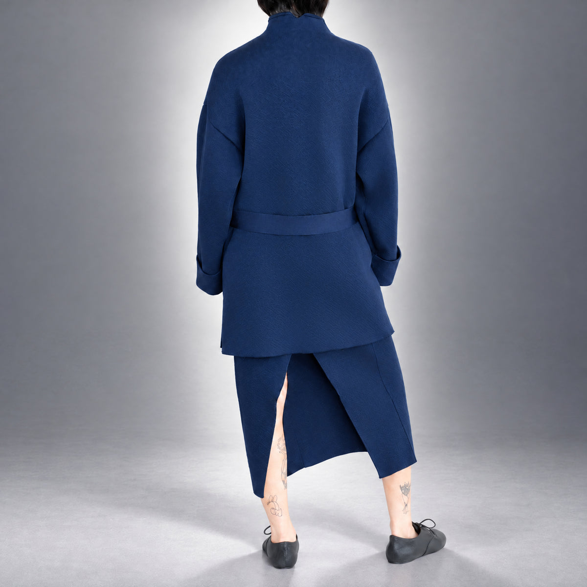 STANDISH. Jessica Coat in Ink Navy, a knit coat, worn, back view #color_ink navy