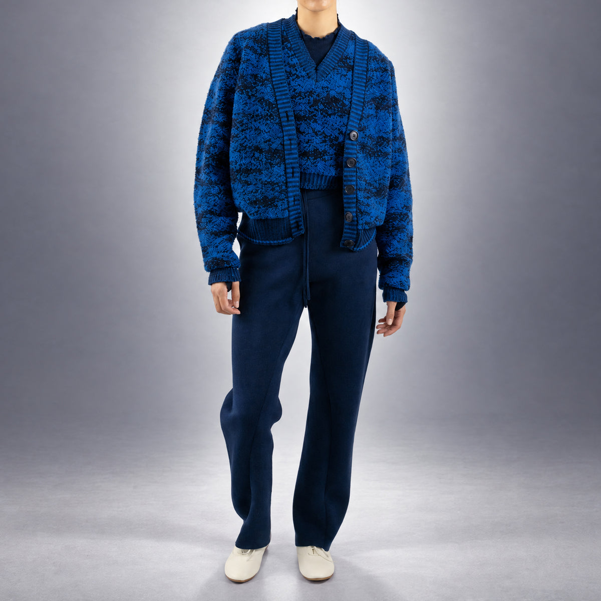 STANDISH. Julie Cardigan in Lapping Blue/Midnight Navy Jacquard, a knit cardigan, worn, front view #color_lapping blue/midnight navy jacquard