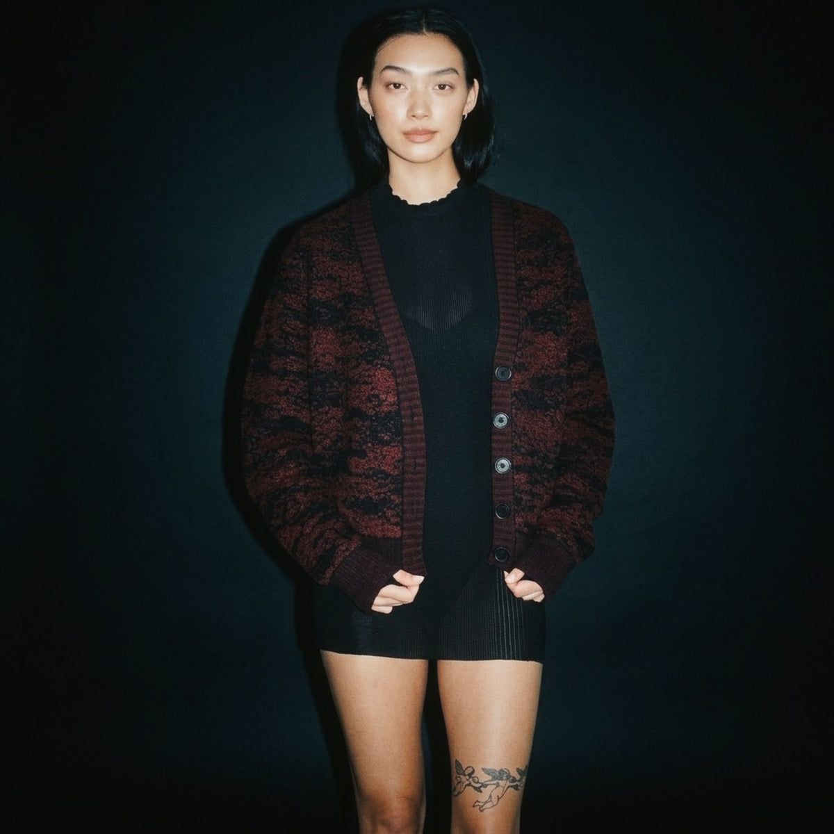 STANDISH. Julie Cardigan in Nocturne Magenta/Carbon Black Jacquard, a knit cardigan, styled editorial shot alternate #color_nocturne magenta/carbon black jacquard