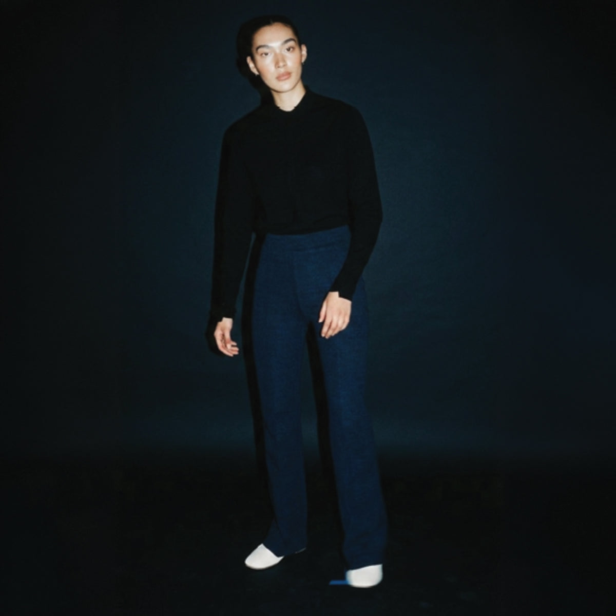 STANDISH. Lola Pant in Ink Navy, a knit pant, styled editorial shot #color_ink navy