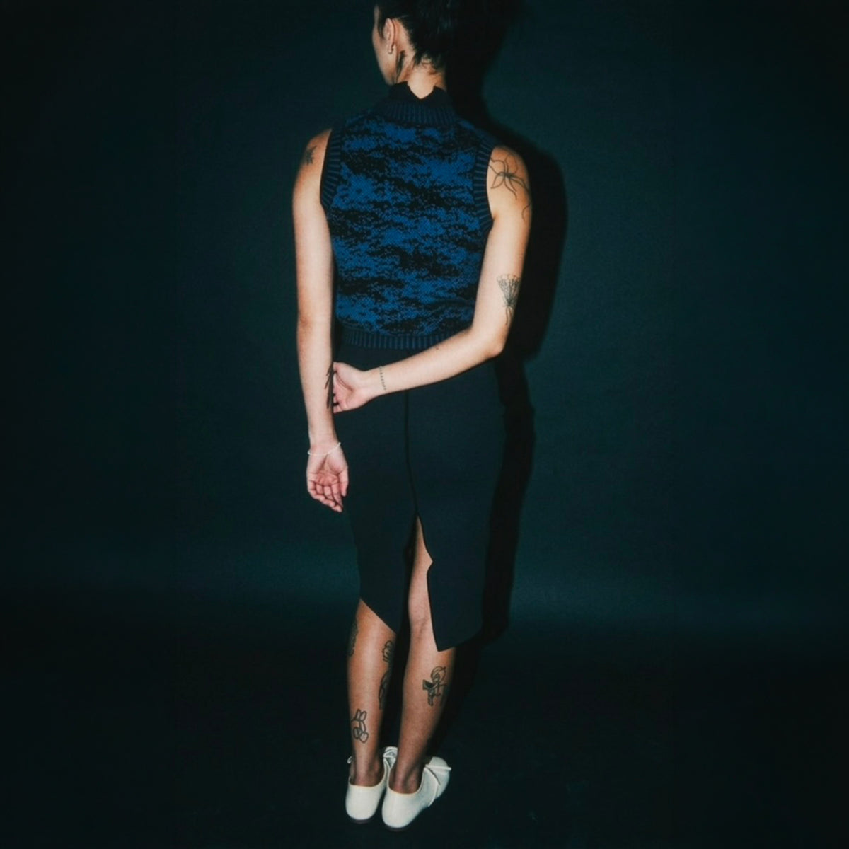 STANDISH. Mickey Skirt in Ink Navy, a knit skirt, styled editorial shot #color_ink navy