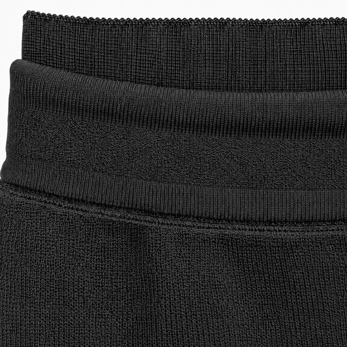 STANDISH. Suzy Track Pant in Carbon Black, close-up of the Organic Italian Supima cotton and mulberry silk knit #color_carbon black